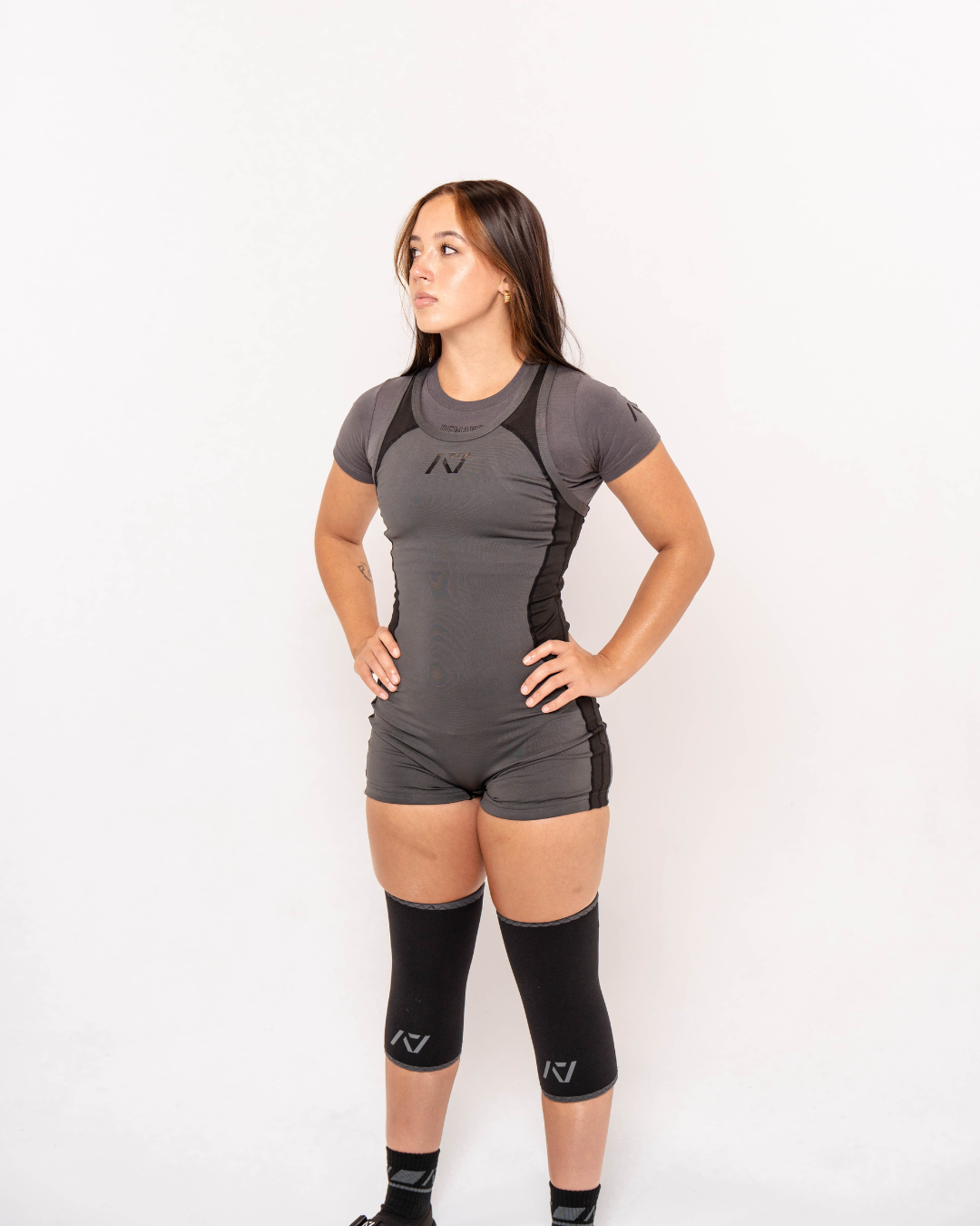 A7 IPF Approved Shadow Stone Grey Luno singlet features extra lat mobility, side panel stitching to guide the squat depth level and curved panel design for a slimming look. The Women's cut singlet features a tapered waist and additional quad room. The IPF Approved Kit includes Luno Powerlifting Singlet, A7 Meet Shirt, A7 Zebra Wrist Wraps, A7 Deadlift Socks, Hourglass Knee Sleeves (Stiff and Rigor Mortis Knee Sleeves). All A7 Powerlifting Equipment shipping to UK, Norway, Switzerland and Iceland.