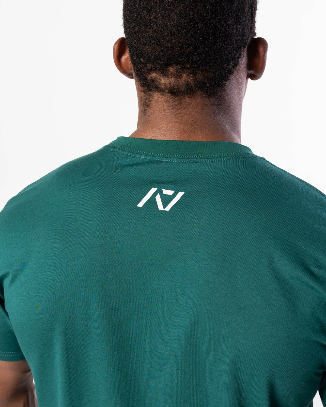 Demand Greatness True-Fit Emerald is our new meet shirt design highlighting Demand Greatness with a double outline font to showcase your impact on the platform. The Shirt is IPF Approved. Shop the full A7 Powerlifting IPF Approved Equipment collection. The IPF Approved Kit includes Powerlifting Singlet, A7 Meet Shirt, A7 Zebra Wrist Wraps, A7 Deadlift Socks, Hourglass Knee Sleeves (Stiff and Rigor Mortis Knee Sleeves). All A7 Powerlifting Equipment shipping to UK, Norway, Switzerland and Iceland.