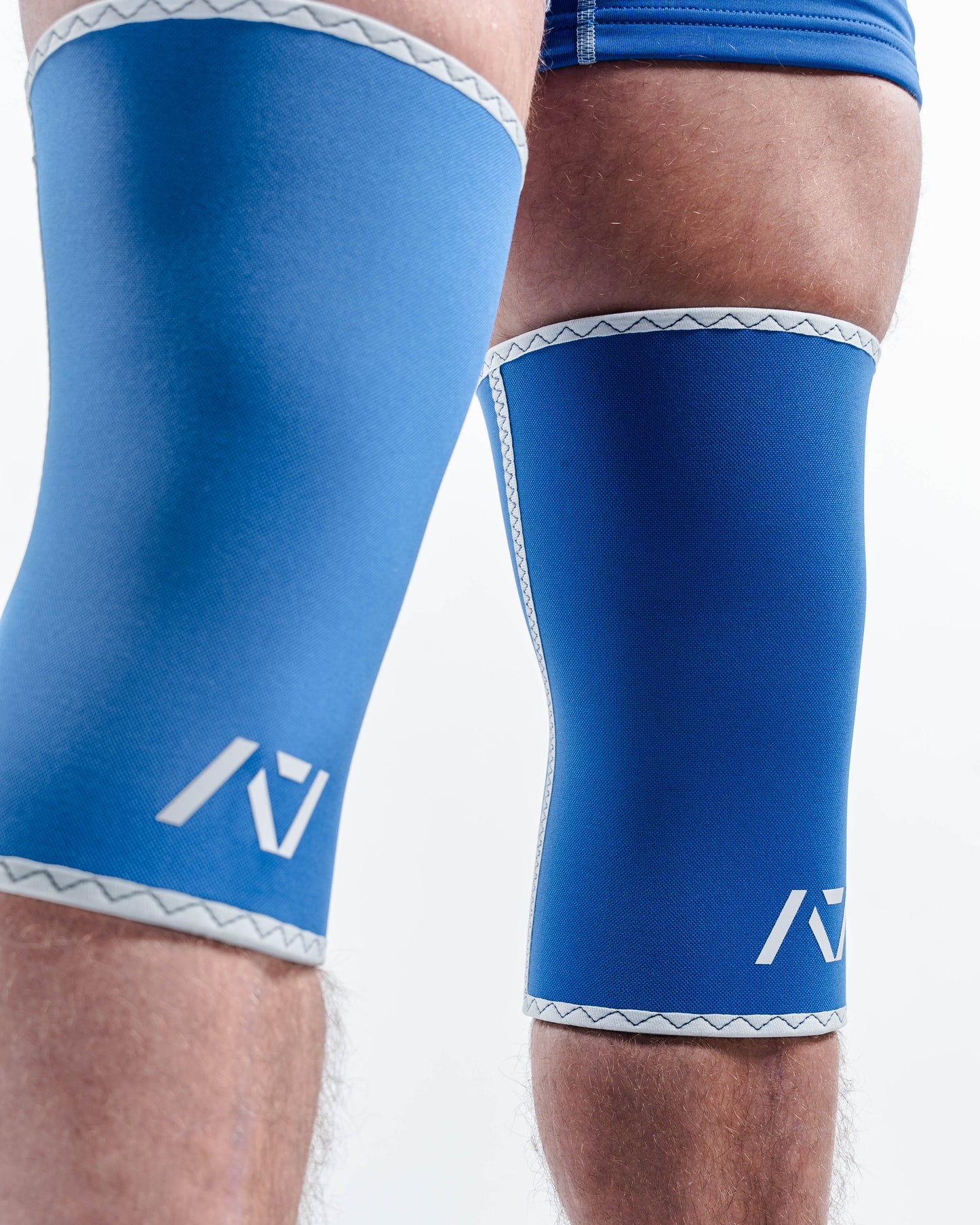A7 IPF Approved Hourglass Knee Sleeves feature an hourglass-shaped centre taper fit to help provide knee compression while maintaining proper tightness around the calf and quad, offered in three stiffnesses (Flexi, Stiff and Rigor Mortis). Shop the full A7 Powerlifting IPF Approved Equipment collection. The IPF Approved Kit includes Powerlifting Singlet, A7 Meet Shirt, A7 Zebra Wrist Wraps and A7 Deadlift Socks. All A7 Powerlifting Equipment shipping to UK, Norway, Switzerland and Iceland.