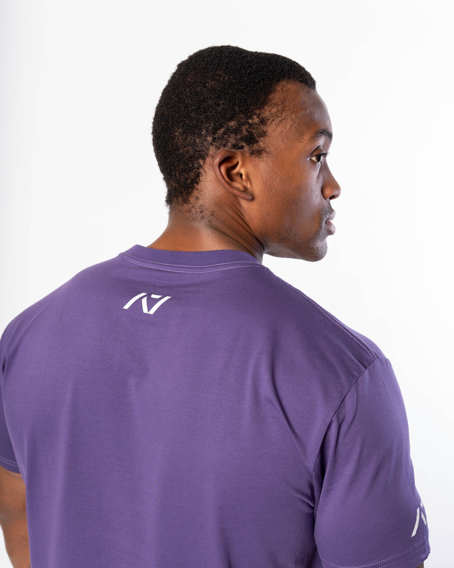 Demand Greatness True-Fit Purple is our new meet shirt design highlighting Demand Greatness with a double outline font to showcase your impact on the platform. The Shirt is IPF Approved. Shop the full A7 Powerlifting IPF Approved Equipment collection. The IPF Approved Kit includes Powerlifting Singlet, A7 Meet Shirt, A7 Zebra Wrist Wraps, A7 Deadlift Socks, Hourglass Knee Sleeves (Stiff and Rigor Mortis Knee Sleeves). All A7 Powerlifting Equipment shipping to UK, Norway, Switzerland and Iceland.