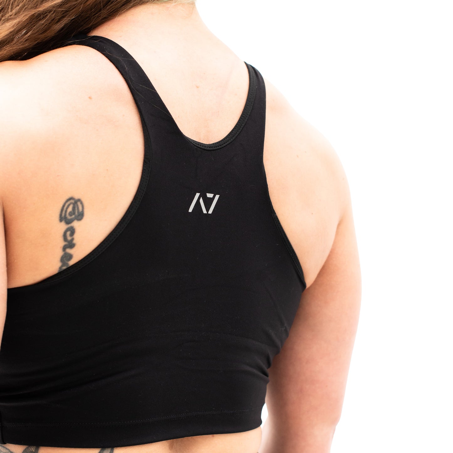 A7 XO Hew Sports Bra or Crop was designed with an active lifestyle in mind. This sports bra is double-lined and offers high-impact support. We minimized the stitching lines and thickened the straps on this sports bra to ensure complete comfort during all your workouts. XO Hew matching crop and leggings are part of a matching gym set from A7. A7 Womenβs Sports Bra is a Bra for Powerlifting. Purchase A7 Sports Bra from A7 UK Shipping to UK.