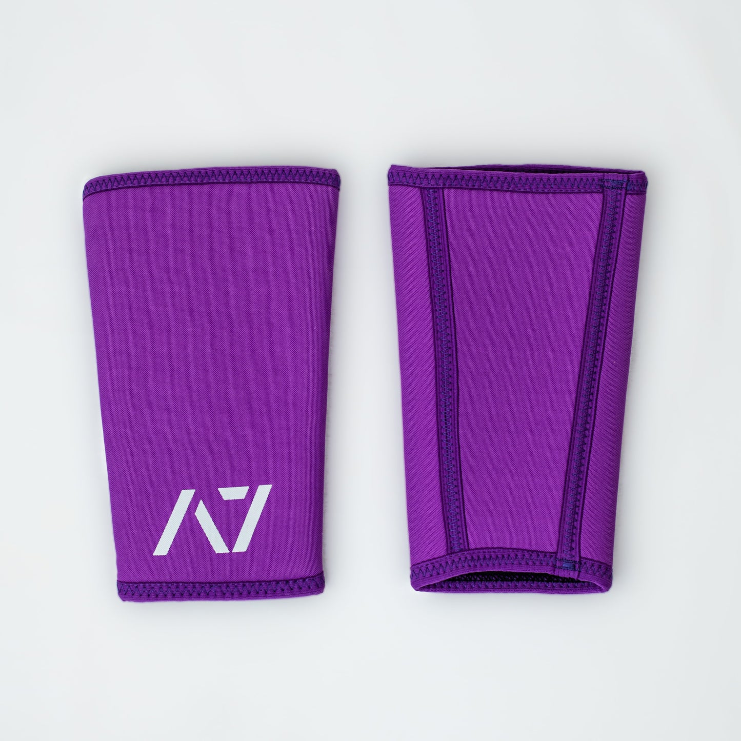 A7 IPF approved Purple CONE knee sleeves are structured with a downward cut panel on the back of the quad and calf to ensure ultimate compression at the knee joint. A7 CONE knee sleeves are IPF approved for use in all powerlifting competitions. A7 CONE Knee Sleeves are IPF Approved Kit. A7 cone knee sleeves are made with high quality neoprene and the knee sleeves are sold as a pair. The double seam on the knee sleeves create a greater tension on the knee joint. A7 UK shipping to UK and Europe.