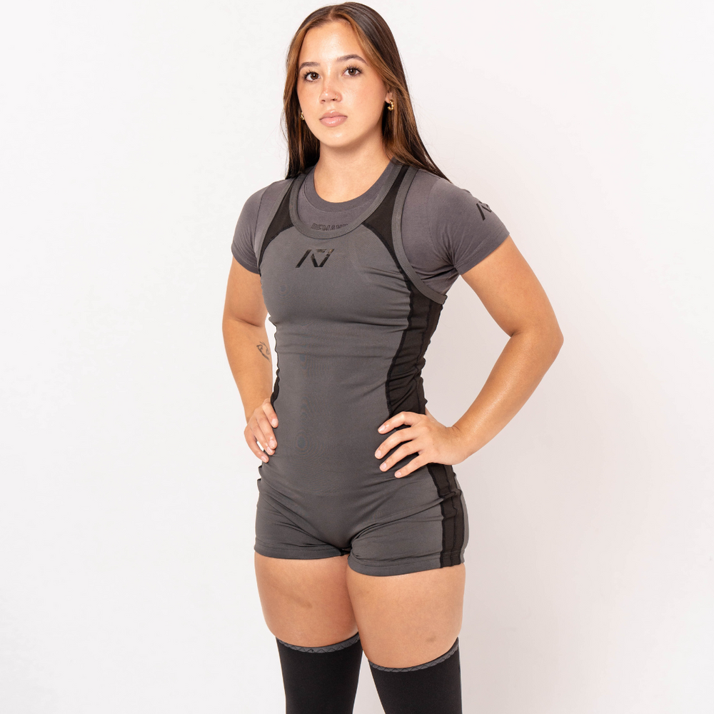 
                      
                        A7 IPF Approved Shadow Stone Grey Luno singlet features extra lat mobility, side panel stitching to guide the squat depth level and curved panel design for a slimming look. The Women's cut singlet features a tapered waist and additional quad room. The IPF Approved Kit includes Luno Powerlifting Singlet, A7 Meet Shirt, A7 Zebra Wrist Wraps, A7 Deadlift Socks, Hourglass Knee Sleeves (Stiff and Rigor Mortis Knee Sleeves). All A7 Powerlifting Equipment shipping to UK, Norway, Switzerland and Iceland.
                      
                    