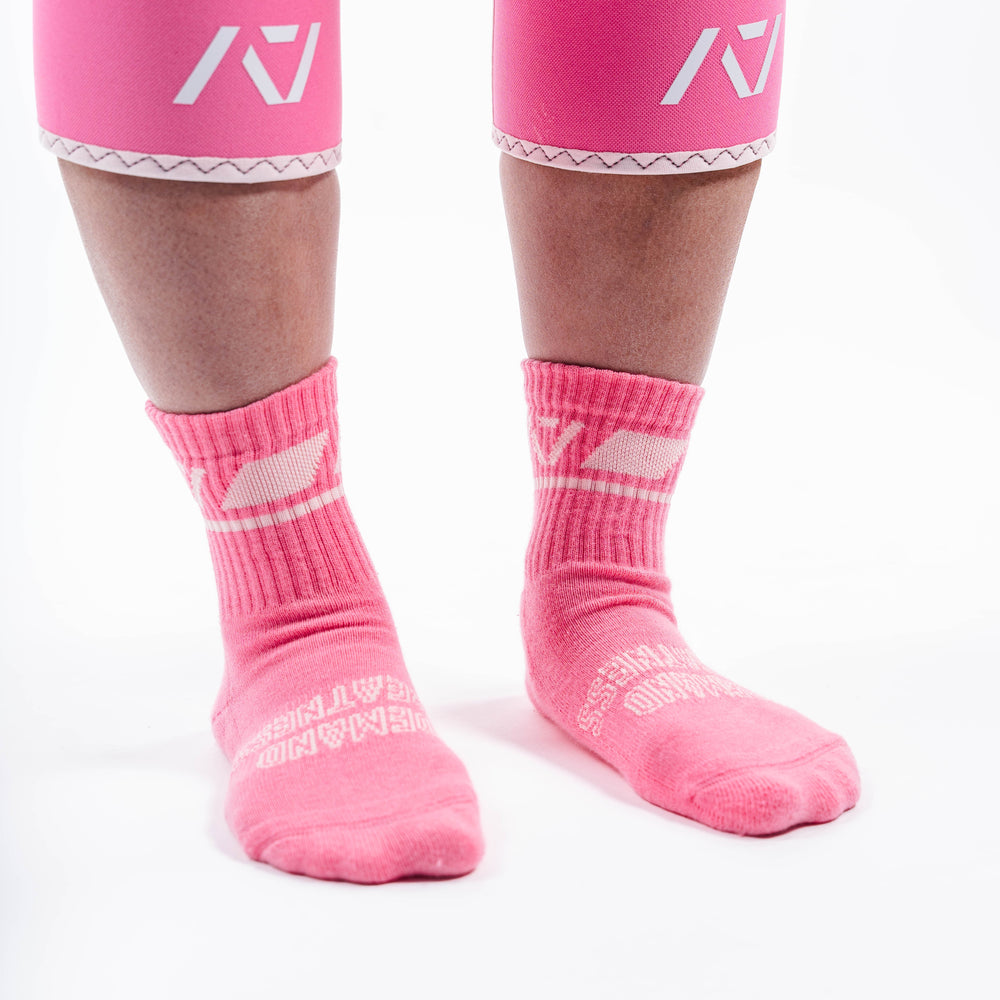 A7 Roseite Crew socks showcase pink logos and let your energy show on the platform, in your training or while out and about. The IPF Approved Night Light Meet Kit includes Powerlifting Singlet, A7 Meet Shirt, A7 Zebra Wrist Wraps, A7 Deadlift Socks, Hourglass Knee Sleeves (Stiff Knee Sleeves and Rigor Mortis Knee Sleeves). All A7 Powerlifting Equipment shipping to UK, Norway, Switzerland and Iceland.