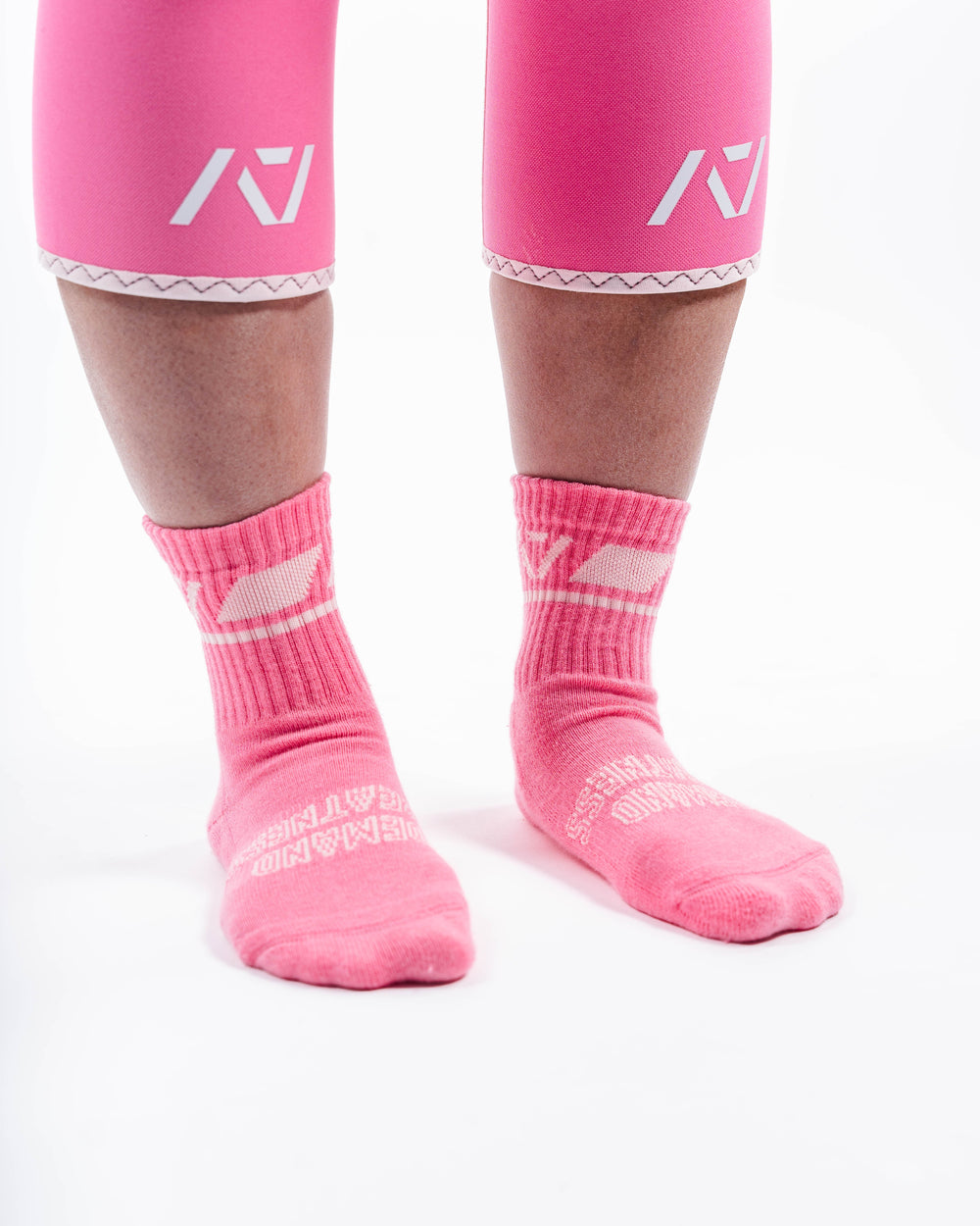 A7 Roseite Crew socks showcase pink logos and let your energy show on the platform, in your training or while out and about. The IPF Approved Night Light Meet Kit includes Powerlifting Singlet, A7 Meet Shirt, A7 Zebra Wrist Wraps, A7 Deadlift Socks, Hourglass Knee Sleeves (Stiff Knee Sleeves and Rigor Mortis Knee Sleeves). All A7 Powerlifting Equipment shipping to UK, Norway, Switzerland and Iceland.