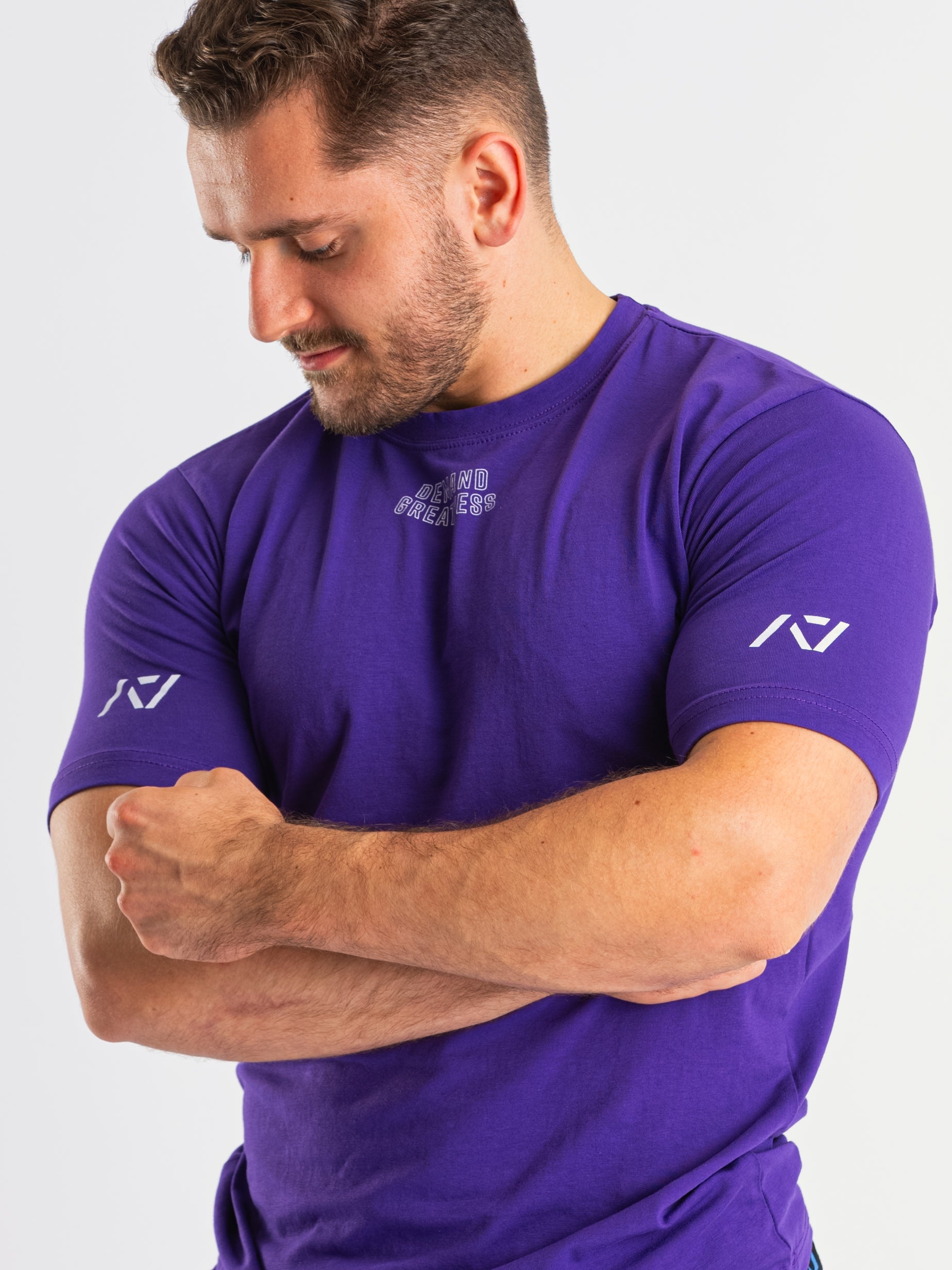 DG23 Purple is our new meet shirt design highlighting Demand Greatness with a double outline font to showcase your impact on the platform. The DG23 Meet Shirt is IPF Approved. Shop the full A7 Powerlifting IPF Approved Equipment collection. The IPF Approved Kit includes Powerlifting Singlet, A7 Meet Shirt, A7 Zebra Wrist Wraps, A7 Deadlift Socks, Hourglass Knee Sleeves (Stiff Knee Sleeves and Rigor Mortis Knee Sleeves). All A7 Powerlifting Equipment shipping to UK, Norway, Switzerland and Iceland.