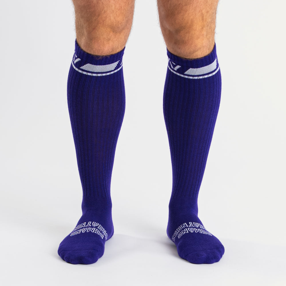 A7 Purple deadlift socks are designed specifically for pulls and keep your shins protected from scrapes. A7 deadlift socks are a perfect pair to wear in training or powerlifting competition. The A7 IPF Approved Kit includes Powerlifting Singlet, A7 Meet Shirt, A7 Zebra Wrist Wraps, A7 Deadlift Socks, Hourglass Knee Sleeves (Stiff Knee Sleeves and Rigor Mortis Knee Sleeves). All A7 Powerlifting Equipment shipping to UK, Norway, Switzerland and Iceland.