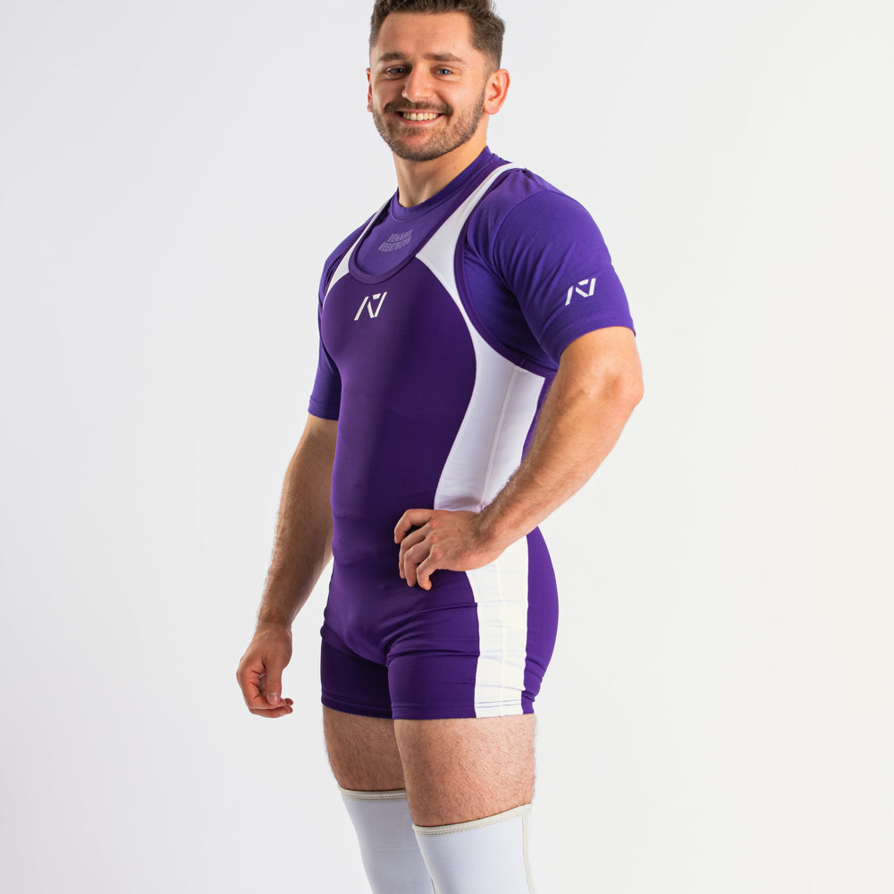 
                      
                        A7 IPF Approved Purple Luno singlet features extra lat mobility, side panel stitching to guide the squat depth level and curved panel design for a slimming look. The Women's cut singlet features a tapered waist and additional quad room. The IPF Approved Kit includes Luno Powerlifting Singlet, A7 Meet Shirt, A7 Zebra Wrist Wraps, A7 Deadlift Socks, Hourglass Knee Sleeves (Stiff Knee Sleeves and Rigor Mortis Knee Sleeves). All A7 Powerlifting Equipment shipping to UK, Norway, Switzerland and Iceland.
                      
                    