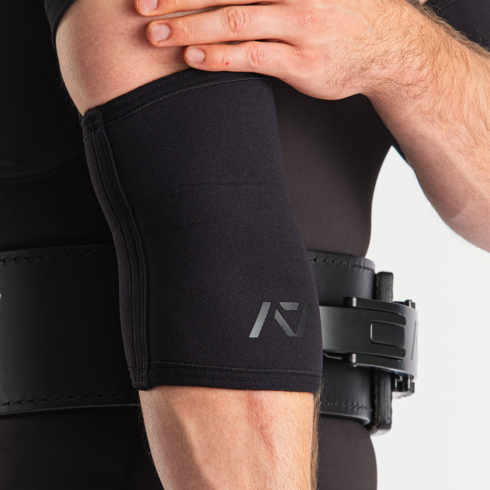 
                      
                        A7 Elbow Sleeves offer you even more support than before with the new and improved neoprene that we use in our Hourglass Knee Sleeves. These elbow sleeves provide support to the elbow joint, whilst allowing full range of motion. All A7 Powerlifting Equipment shipping to UK, Norway, Switzerland and Iceland. 
                      
                    