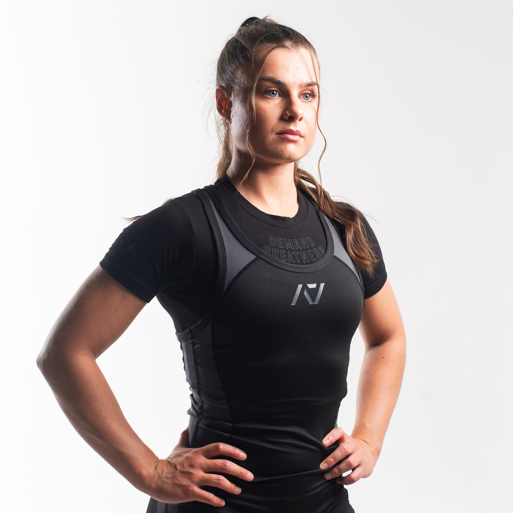 
                      
                        A7 IPF Approved Shadow Stone Luno singlet features extra lat mobility, side panel stitching to guide the squat depth level and curved panel design for a slimming look. The Women's cut singlet features a tapered waist and additional quad room. The IPF Approved Kit includes Luno Powerlifting Singlet, A7 Meet Shirt, A7 Zebra Wrist Wraps, A7 Deadlift Socks, Hourglass Knee Sleeves (Stiff Knee Sleeves and Rigor Mortis Knee Sleeves). All A7 Powerlifting Equipment shipping to UK, Norway, Switzerland and Iceland.
                      
                    