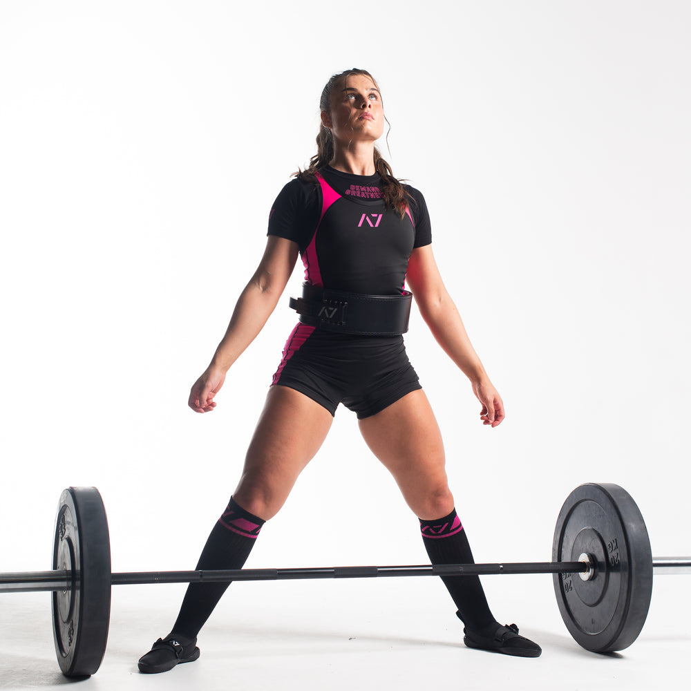 
                      
                        A7 IPF Approved Flamingo Luno singlet features extra lat mobility, side panel stitching to guide the squat depth level and curved panel design for a slimming look. The Women's cut singlet features a tapered waist and additional quad room. The IPF Approved Kit includes Luno Powerlifting Singlet, A7 Meet Shirt, A7 Zebra Wrist Wraps, A7 Deadlift Socks, Hourglass Knee Sleeves (Stiff Knee Sleeves and Rigor Mortis Knee Sleeves). All A7 Powerlifting Equipment shipping to UK, Norway, Switzerland and Iceland.
                      
                    