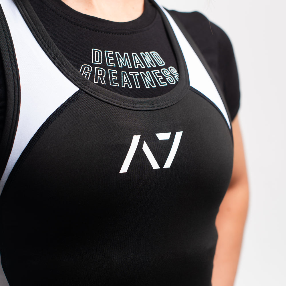 
                      
                        A7 IPF Approved Domino Luno singlet features extra lat mobility, side panel stitching to guide the squat depth level and curved panel design for a slimming look. The Women's cut singlet features a tapered waist and additional quad room. The IPF Approved Kit includes Luno Powerlifting Singlet, A7 Meet Shirt, A7 Zebra Wrist Wraps, A7 Deadlift Socks, Hourglass Knee Sleeves (Stiff Knee Sleeves and Rigor Mortis Knee Sleeves). All A7 Powerlifting Equipment shipping to UK, Norway, Switzerland and Iceland.
                      
                    