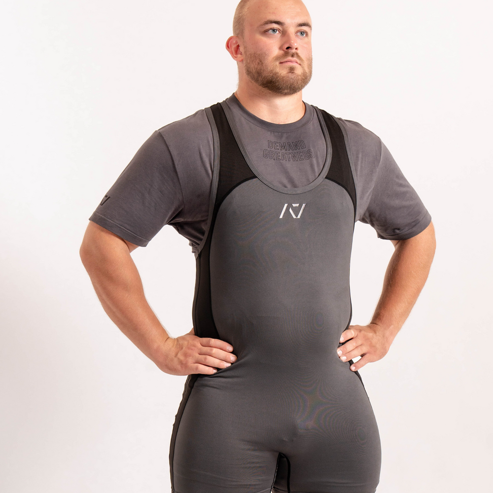 
                      
                        A7 IPF Approved Shadow Stone Grey Luno singlet features extra lat mobility, side panel stitching to guide the squat depth level and curved panel design for a slimming look. The Women's cut singlet features a tapered waist and additional quad room. The IPF Approved Kit includes Luno Powerlifting Singlet, A7 Meet Shirt, A7 Zebra Wrist Wraps, A7 Deadlift Socks, Hourglass Knee Sleeves (Stiff and Rigor Mortis Knee Sleeves). All A7 Powerlifting Equipment shipping to UK, Norway, Switzerland and Iceland.
                      
                    