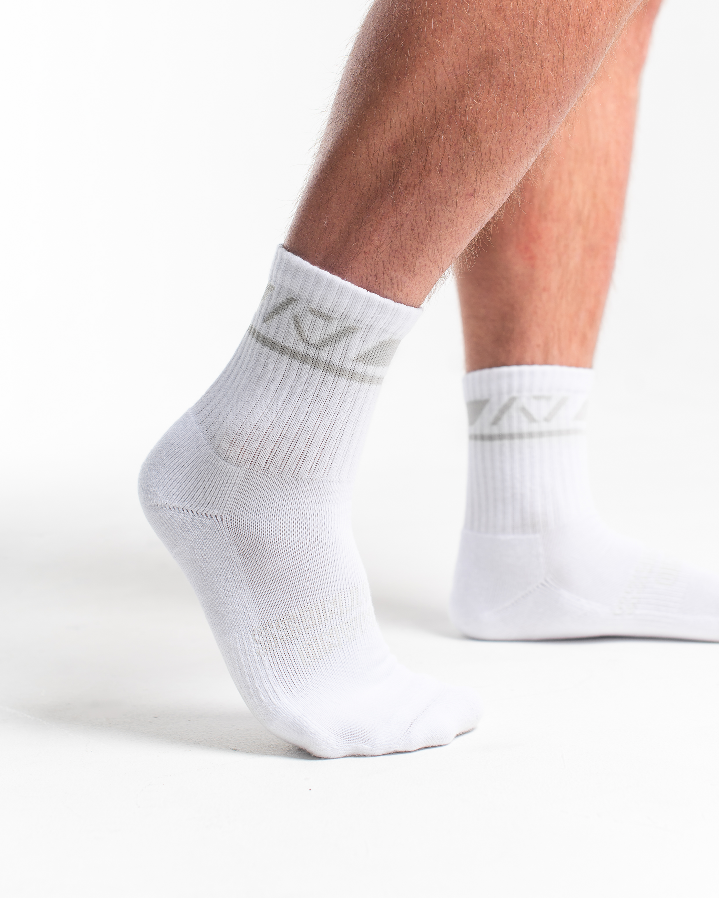 A7 Polar Crew socks showcase light grey logos and let your energy show on the platform, in your training or while out and about. The IPF Approved Polar Meet Kit includes Powerlifting Singlet, A7 Meet Shirt, A7 Zebra Wrist Wraps, A7 Deadlift Socks, Hourglass Knee Sleeves (Stiff Knee Sleeves and Rigor Mortis Knee Sleeves). All A7 Powerlifting Equipment shipping to UK, Norway, Switzerland and Iceland.