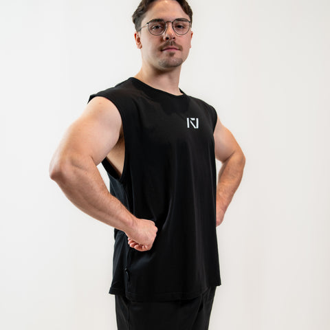 Just like our high-demand over-fit shirts, the Over-Fit Cut Off Shirt offers one of the best covers in the gym while giving you complete freedom of movement; or perfect for lounging in style. Designed for those upper-body days when it gets hot but you still want to keep your torso covered, this tank keeps you comfortable, flexible, and ready for every lift. All A7 Powerlifting Equipment shipping to UK, Norway, Switzerland and Iceland.