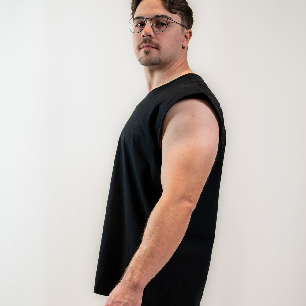 
                      
                        Just like our high-demand over-fit shirts, the Over-Fit Cut Off Shirt offers one of the best covers in the gym while giving you complete freedom of movement; or perfect for lounging in style. Designed for those upper-body days when it gets hot but you still want to keep your torso covered, this tank keeps you comfortable, flexible, and ready for every lift. All A7 Powerlifting Equipment shipping to UK, Norway, Switzerland and Iceland.
                      
                    