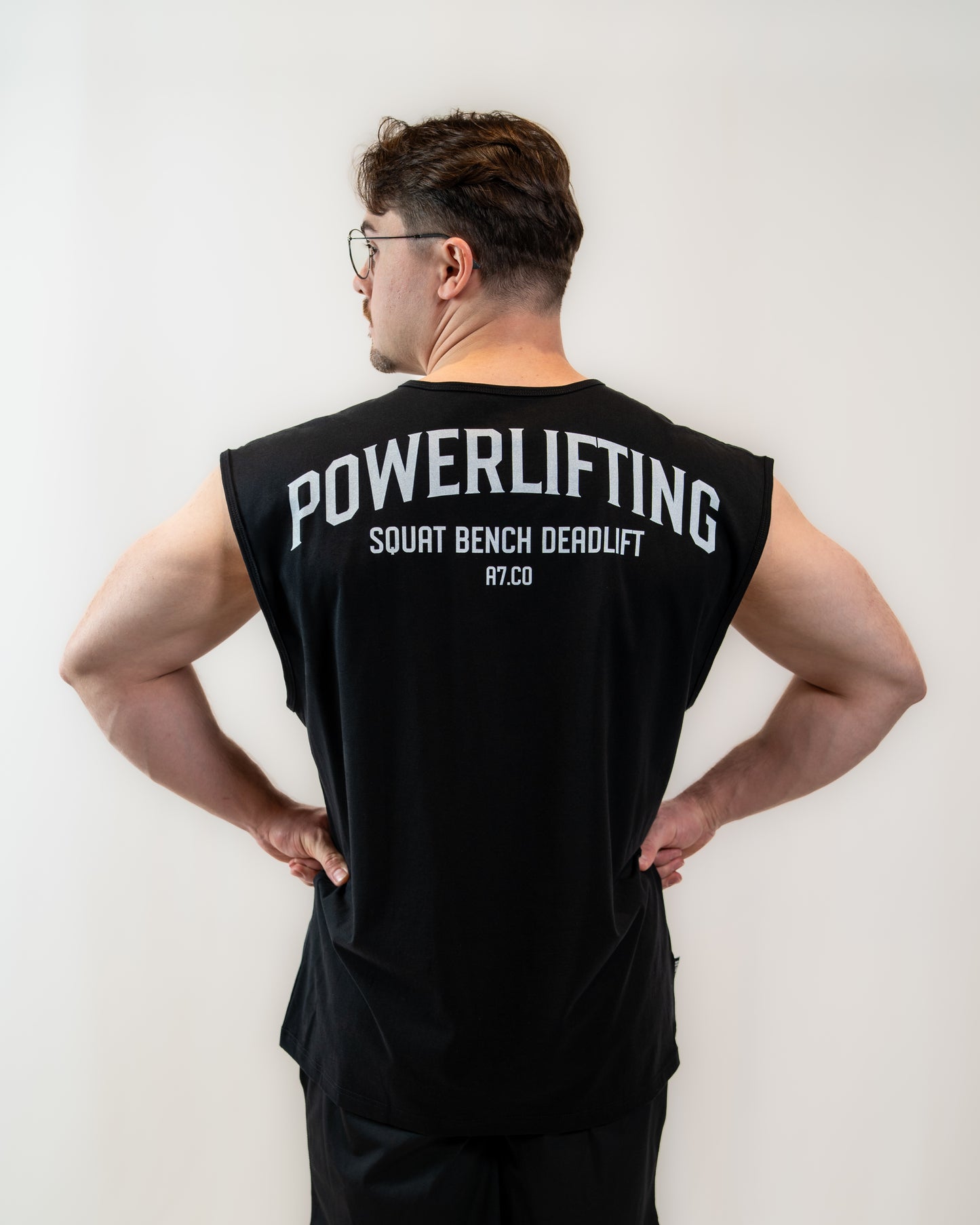 Just like our high-demand over-fit shirts, the Over-Fit Cut Off Shirt offers one of the best covers in the gym while giving you complete freedom of movement; or perfect for lounging in style. Designed for those upper-body days when it gets hot but you still want to keep your torso covered, this tank keeps you comfortable, flexible, and ready for every lift. All A7 Powerlifting Equipment shipping to UK, Norway, Switzerland and Iceland.