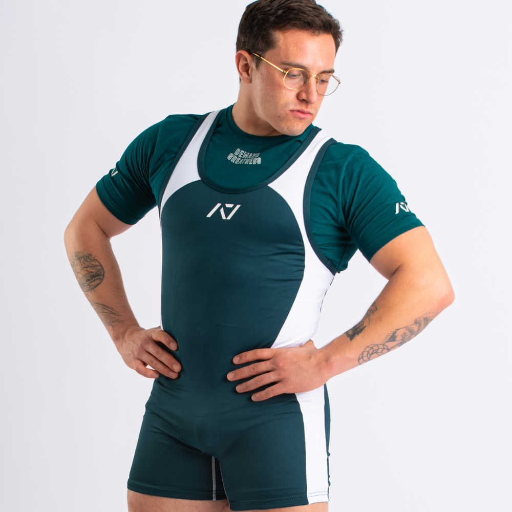 
                      
                        A7 IPF Approved Emerald Forás Luno singlet features extra lat mobility, side panel stitching to guide the squat depth level and curved panel design for a slimming look. The Women's cut singlet features a tapered waist and additional quad room. The IPF Approved Kit includes Luno Powerlifting Singlet, A7 Meet Shirt, A7 Zebra Wrist Wraps, A7 Deadlift Socks, Hourglass Knee Sleeves (Stiff Knee Sleeves and Rigor Mortis Knee Sleeves). All A7 Powerlifting Equipment shipping to UK, Norway, Switzerland and Iceland.
                      
                    