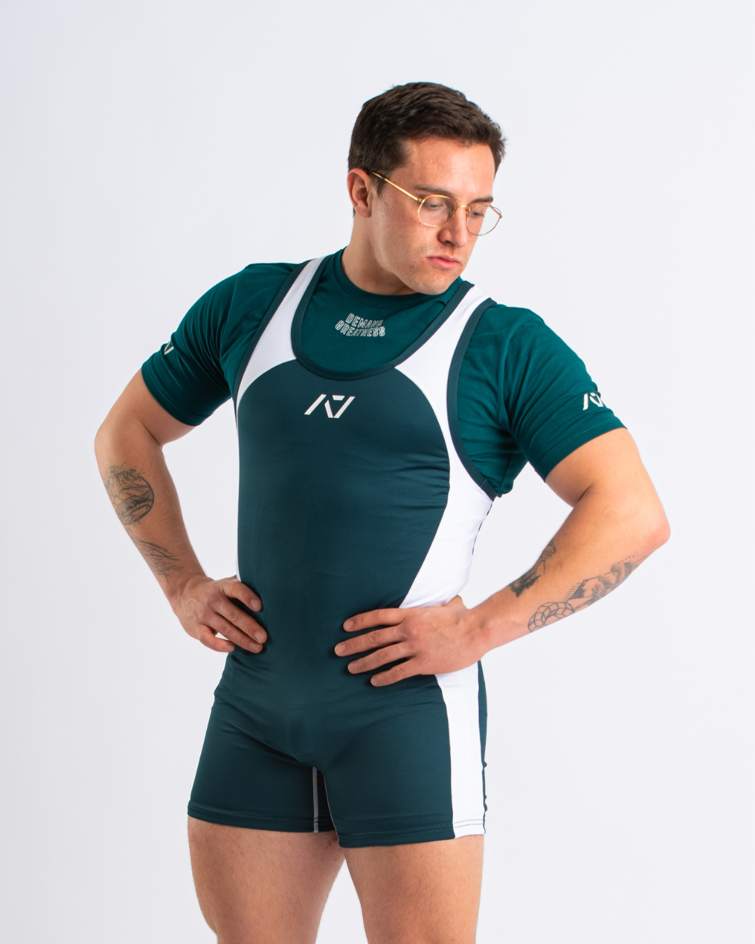 A7 IPF Approved Emerald Forás Luno singlet features extra lat mobility, side panel stitching to guide the squat depth level and curved panel design for a slimming look. The Women's cut singlet features a tapered waist and additional quad room. The IPF Approved Kit includes Luno Powerlifting Singlet, A7 Meet Shirt, A7 Zebra Wrist Wraps, A7 Deadlift Socks, Hourglass Knee Sleeves (Stiff Knee Sleeves and Rigor Mortis Knee Sleeves). All A7 Powerlifting Equipment shipping to UK, Norway, Switzerland and Iceland.