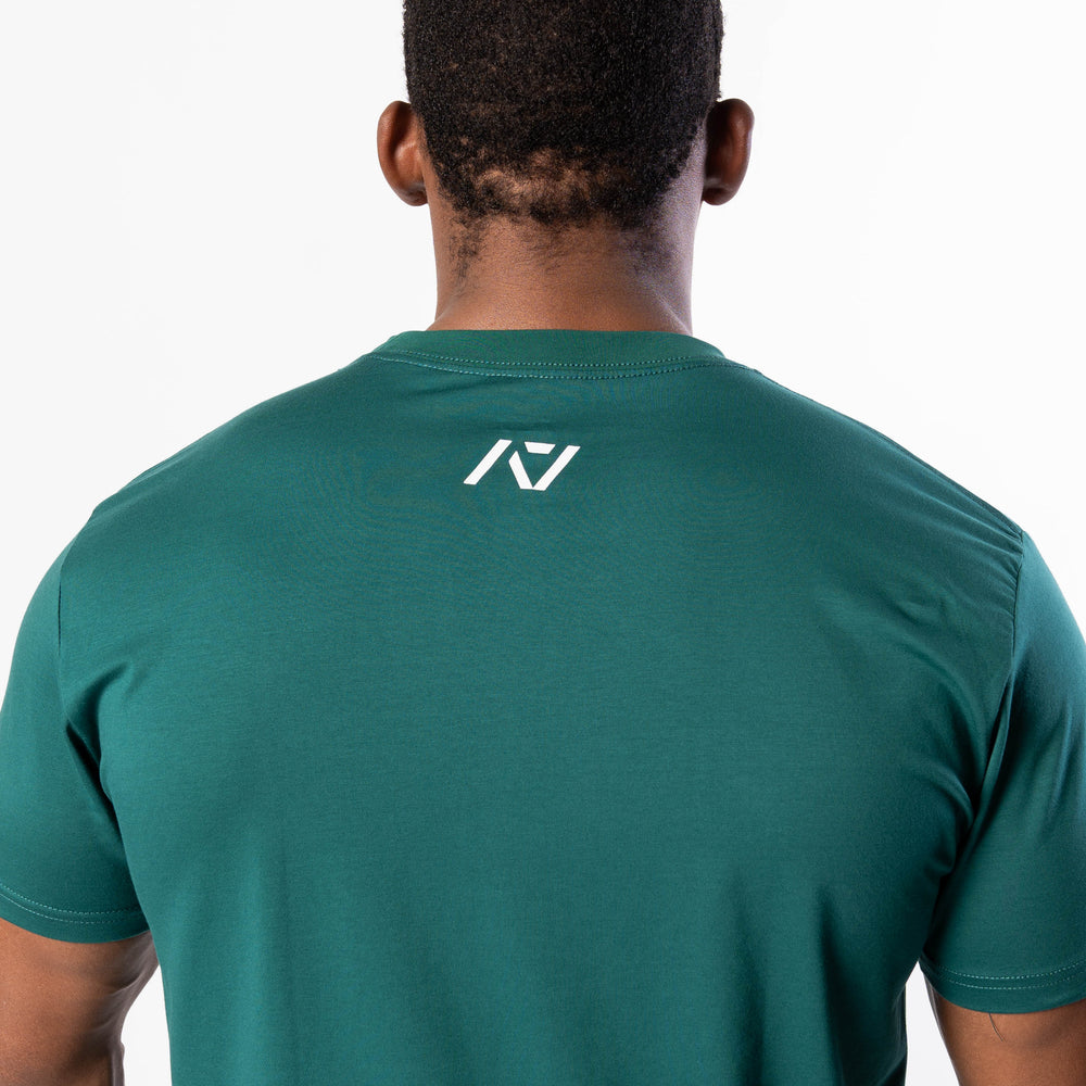 
                      
                        Demand Greatness True-Fit Men's Meet Shirt - IPF Approved - Emerald Forás
                      
                    