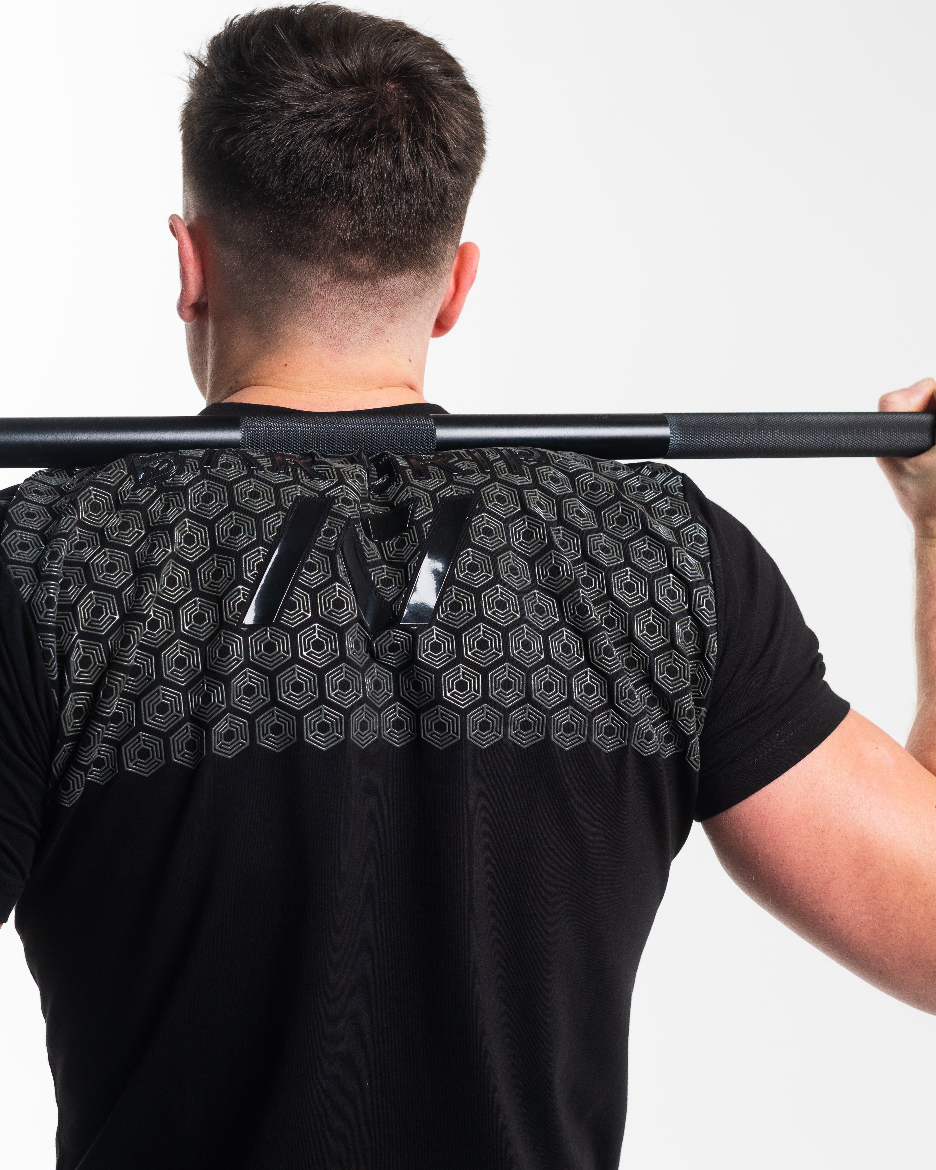 Crest is our classic black on black design. With the Stealth Bar Grip Shirt you can be noticed, yet still, be able to be subtle. The A7 silicone bar grip helps with slippery commercial benches and bars and anchors the barbell to your back. All A7 Powerlifting Equipment shipping to UK, Norway, Switzerland and Iceland.