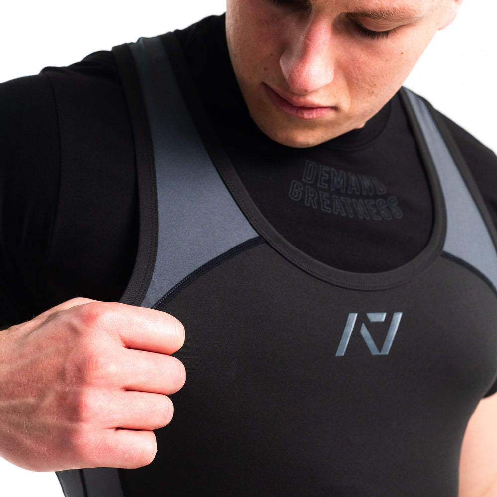
                      
                        A7 IPF Approved Shadow Stone Luno singlet features extra lat mobility, side panel stitching to guide the squat depth level and curved panel design for a slimming look. The Women's cut singlet features a tapered waist and additional quad room. The IPF Approved Kit includes Luno Powerlifting Singlet, A7 Meet Shirt, A7 Zebra Wrist Wraps, A7 Deadlift Socks, Hourglass Knee Sleeves (Stiff Knee Sleeves and Rigor Mortis Knee Sleeves). All A7 Powerlifting Equipment shipping to UK, Norway, Switzerland and Iceland. 
                      
                    