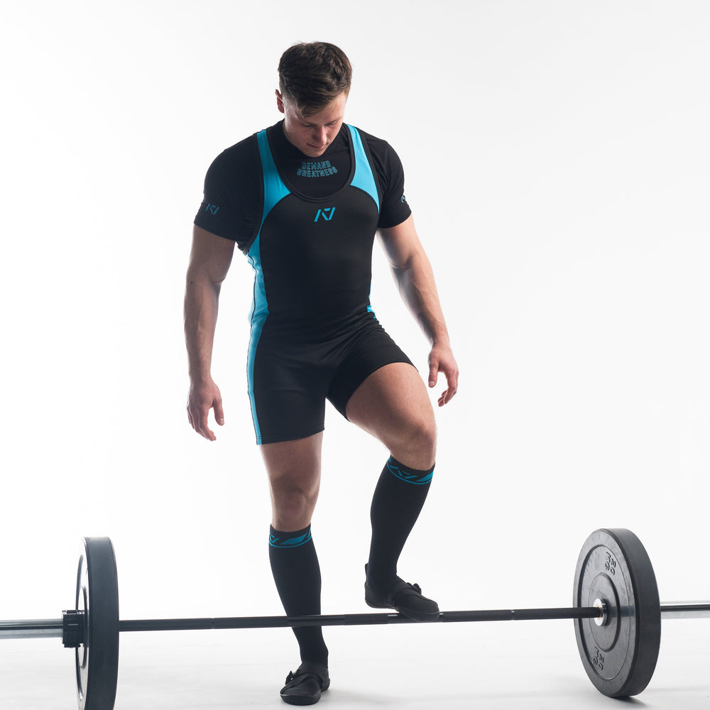 
                      
                        A7 IPF Approved Azul Luno singlet features extra lat mobility, side panel stitching to guide the squat depth level and curved panel design for a slimming look. The Women's cut singlet features a tapered waist and additional quad room. The IPF Approved Kit includes Luno Powerlifting Singlet, A7 Meet Shirt, A7 Deadlift Socks, Hourglass Knee Sleeves (Stiff Knee Sleeves and Rigor Mortis Knee Sleeves). All A7 Powerlifting Equipment shipping to UK, Norway, Switzerland and Iceland.
                      
                    