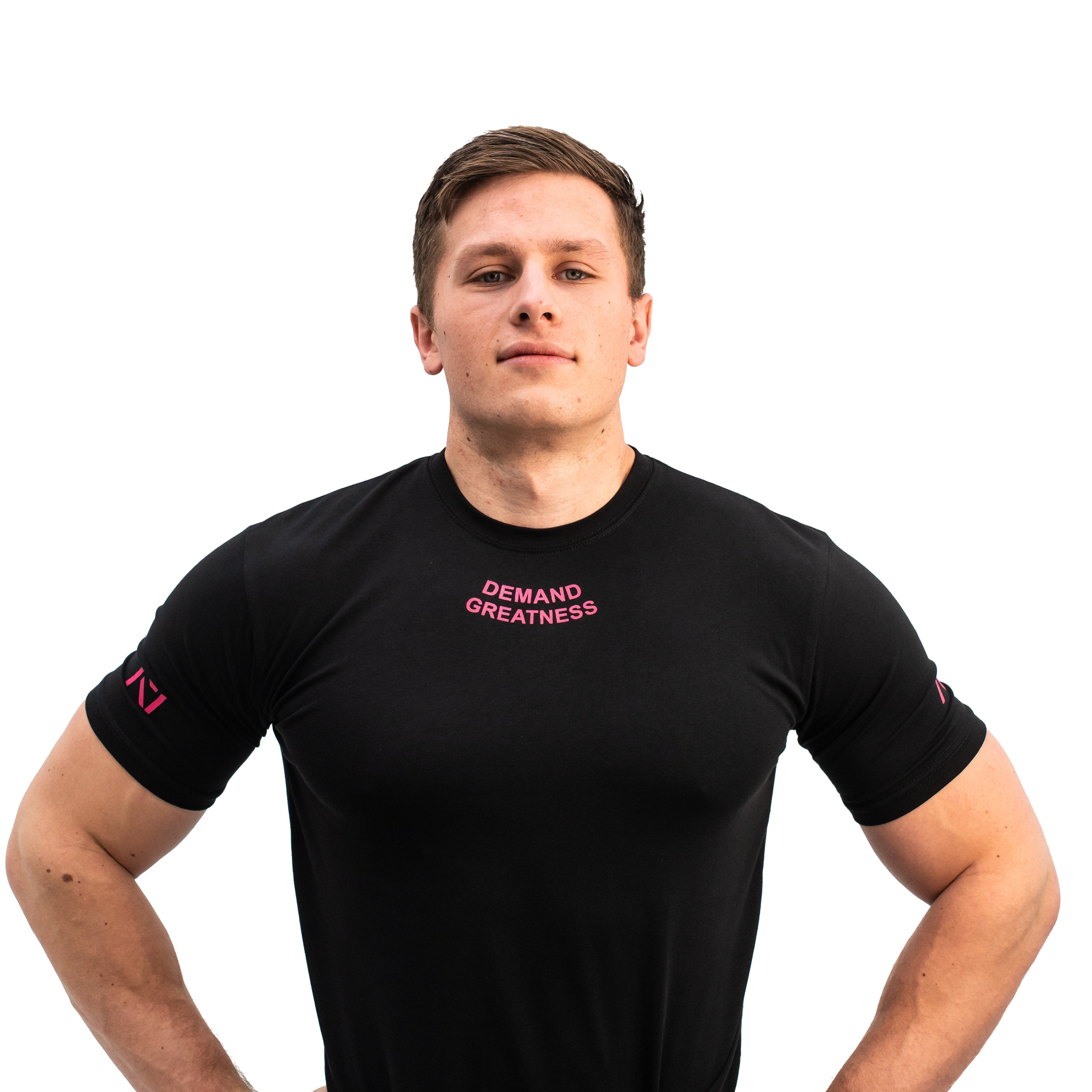 Standout from the crowd in our Pink Demand Greatness Meet Shirt and let your energy show on the platform, in your training or while out and about. Our Meet tees offer a level of comfort like no other through their unique blend of materials and stretch in the places you desire for a comfortable fit that keeps your mind on your performance
