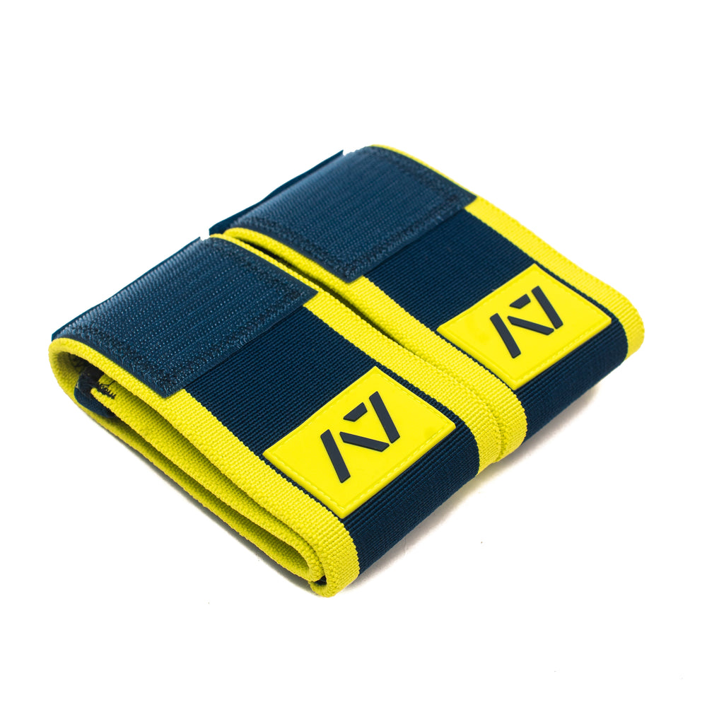 
                      
                        This Electric Lemonade colourway is a refreshing cup of lemonade on a hot day. A colourway that stands out on the platform, while still providing the level of quality, support and comfort you demand from your products. These wrist wraps will remind you to bring your electricity to hit those lifts. These wrist wraps are a perfect addition to your IPF approved kit.
                      
                    