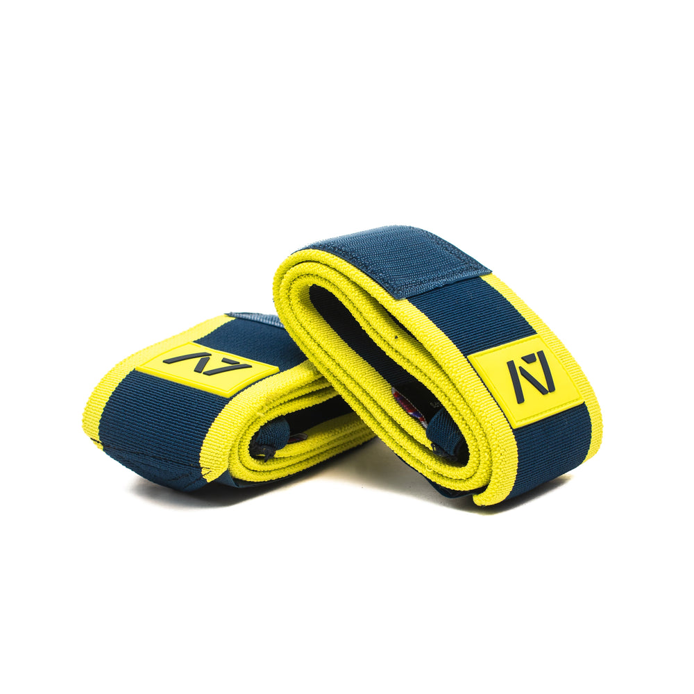
                      
                        This Electric Lemonade colourway is a refreshing cup of lemonade on a hot day. A colourway that stands out on the platform, while still providing the level of quality, support and comfort you demand from your products. These wrist wraps will remind you to bring your electricity to hit those lifts. These wrist wraps are a perfect addition to your IPF approved kit.
                      
                    