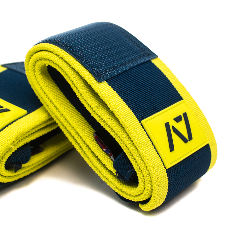 
                      
                        This Electric Lemonade colourway is a refreshing cup of lemonade on a hot day. A colourway that stands out on the platform, while still providing the level of quality, support and comfort you demand from your products. These wrist wraps will remind you to bring your electricity to hit those lifts. These wrist wraps are a perfect addition to your IPF approved kit.
                      
                    