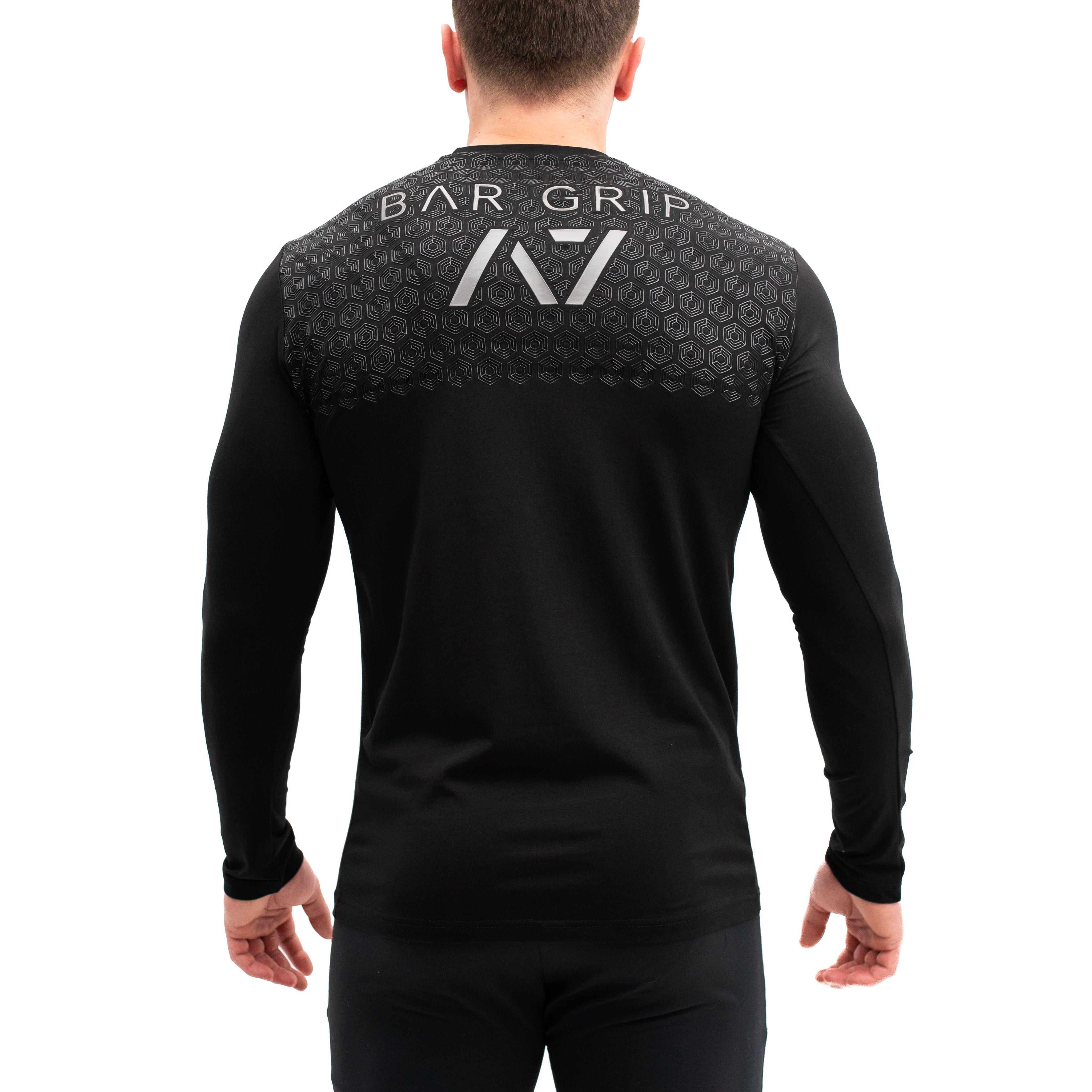 The Conquer Bar Grip Shirt reminds us we can conquer challenges and make an impact. The future is only the continuation of our progress. Purchase Conquer Bar Grip from A7 UK and A7 Europe. The silicone grip helps with slippery commercial benches and bars and anchors the barbell to your back. A7UK has the best Powerlifting apparel for all workouts. Available in UK and Europe including France, Italy, Germany, the Netherlands, Sweden and Poland.