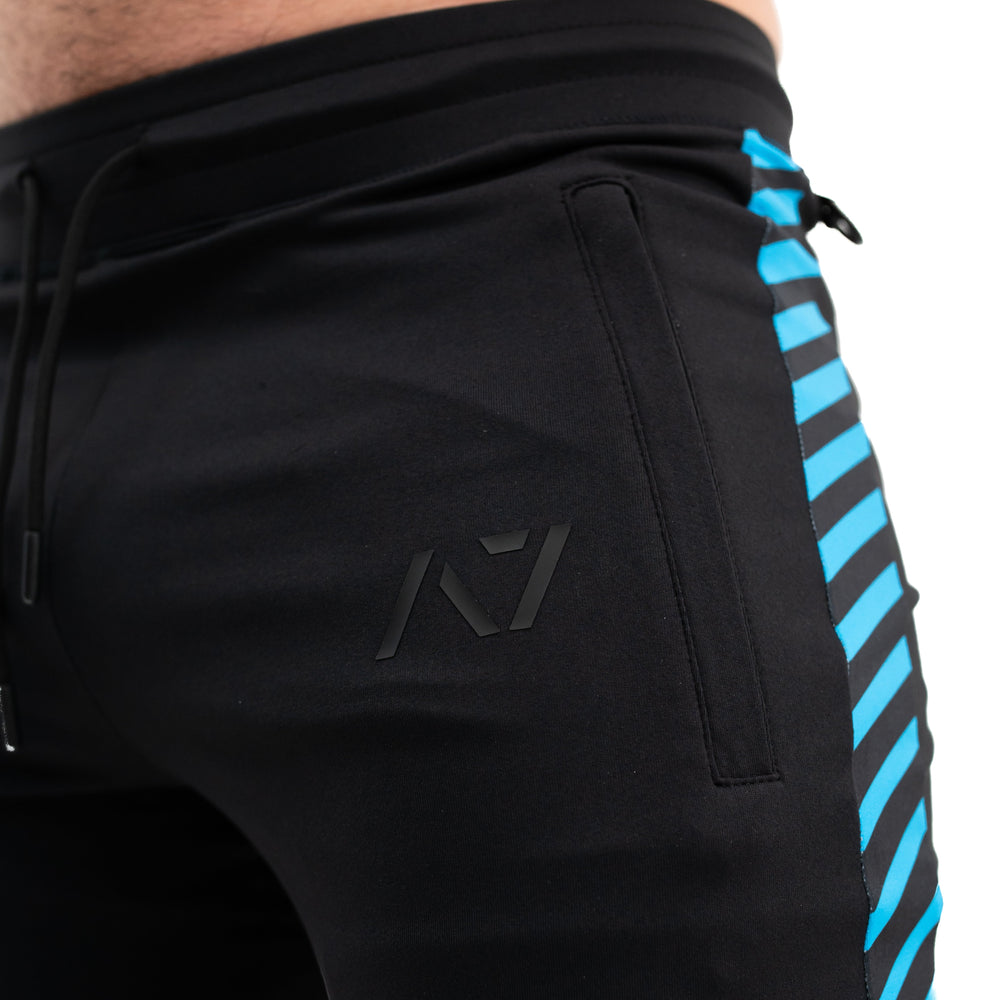 
                      
                        A7 Ripple Defy joggers are just as comfortable in the gym as they are going out. These are made with premium moisture-wicking 4-way-stretch material for greater range of motion. These are a great fit for both men and women and offer deep zippered pockets and tapered leg design. Purchase Ripple Defy Joggers from A7 UK shipping to UK or A7 Europe shipping to EU.
                      
                    