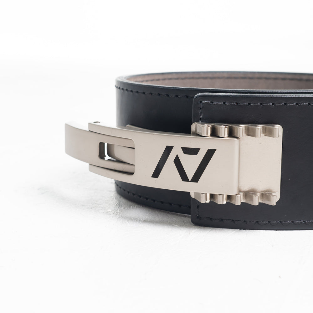
                      
                        A7 IPF Approved Lever Belt features a black design with black leather, silver engraved buckle and debossed A7 logo on the leather. The new Pioneer Adjustable Lever, PAL, buckle allows you to quickly adjust the tightness of your belt for a perfect fit. The IPF Approved Kit includes Singlet, A7 Meet Shirt, A7 Zebra Wrist Wraps, A7 Deadlift Socks, Hourglass Knee Sleeves (Stiff Knee Sleeves and Rigor Mortis Knee Sleeves). All A7 Powerlifting Equipment shipping to UK, Norway, Switzerland and Iceland.
                      
                    