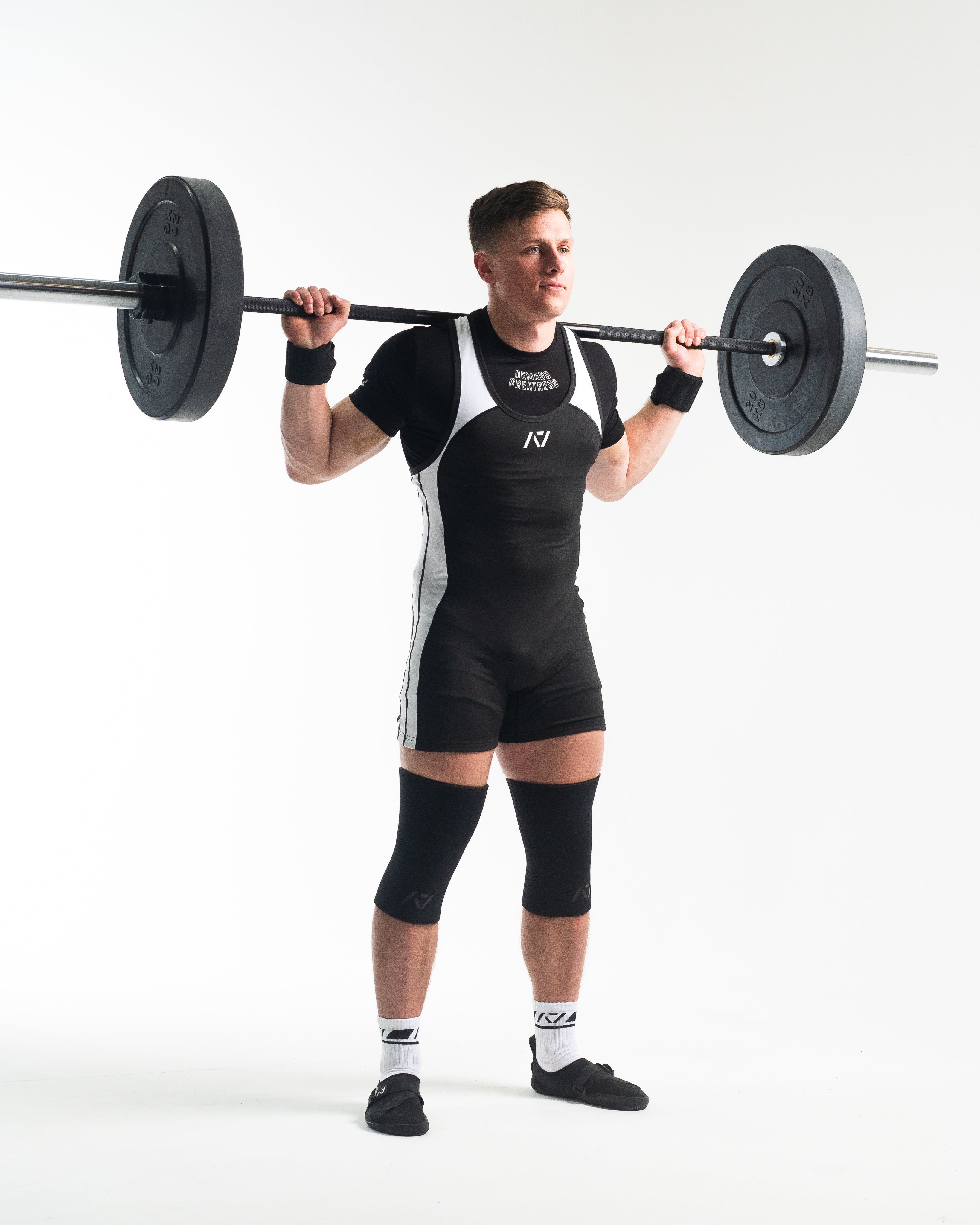 A7 IPF Approved Domino Luno singlet features extra lat mobility, side panel stitching to guide the squat depth level and curved panel design for a slimming look. The Women's cut singlet features a tapered waist and additional quad room. The IPF Approved Kit includes Luno Powerlifting Singlet, A7 Meet Shirt, A7 Zebra Wrist Wraps, A7 Deadlift Socks, Hourglass Knee Sleeves (Stiff Knee Sleeves and Rigor Mortis Knee Sleeves). All A7 Powerlifting Equipment shipping to UK, Norway, Switzerland and Iceland.