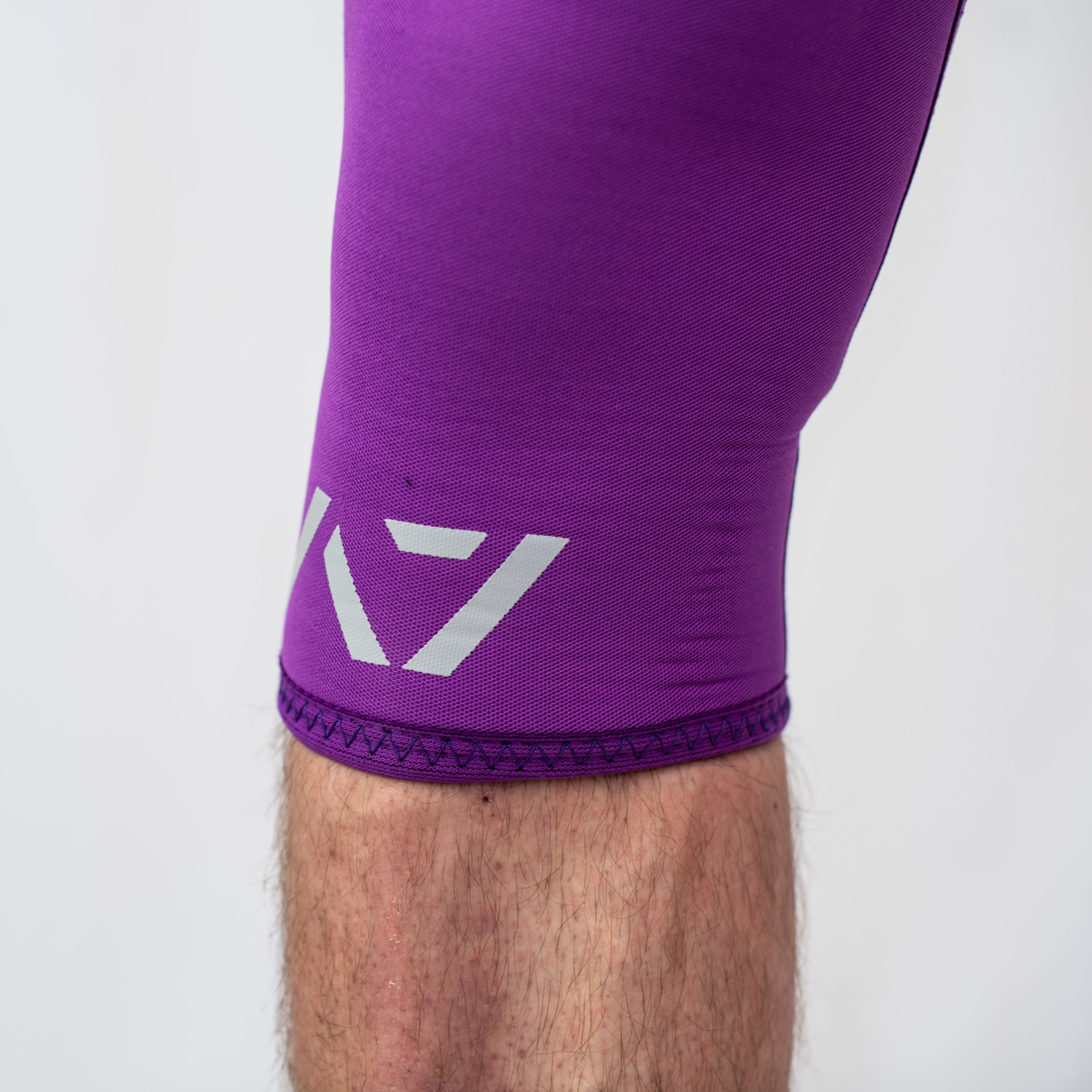 A7 IPF approved Purple CONE knee sleeves are structured with a downward cut panel on the back of the quad and calf to ensure ultimate compression at the knee joint. A7 CONE knee sleeves are IPF approved for use in all powerlifting competitions. A7 CONE Knee Sleeves are IPF Approved Kit. A7 cone knee sleeves are made with high quality neoprene and the knee sleeves are sold as a pair. The double seam on the knee sleeves create a greater tension on the knee joint. A7 UK shipping to UK and Europe. 