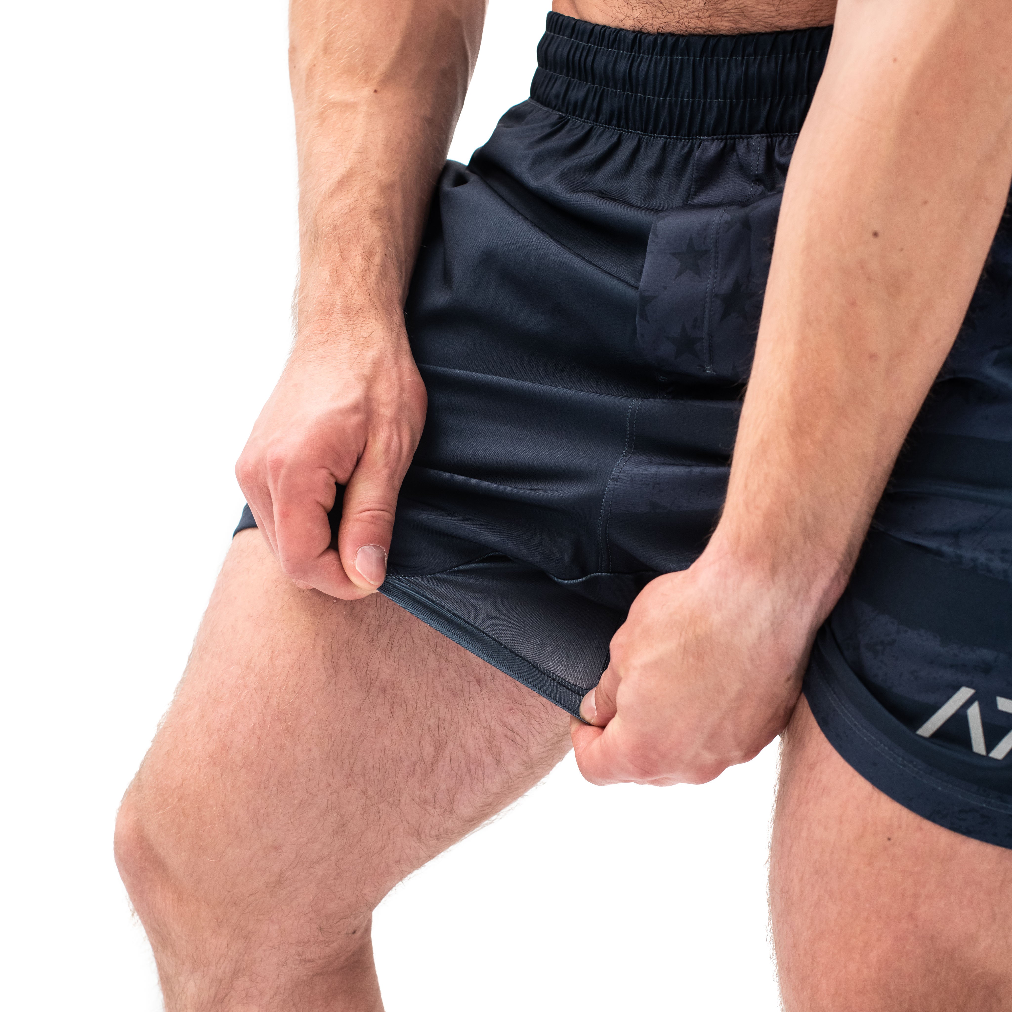 Squatting hot sale shorts mens