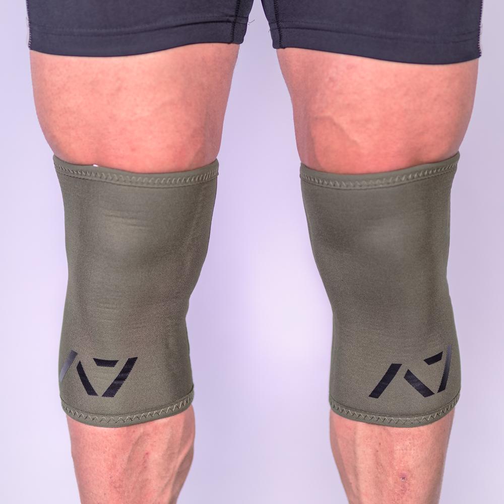 A7 IPF approved Military CONE knee sleeves are structured with a downward cut panel on the back of the quad and calf to ensure ultimate compression at the knee joint. A7 CONE knee sleeves are IPF approved for use in all powerlifting competitions. A7 CONE Knee Sleeves are IPF Approved Kit. A7 cone knee sleeves are made with high quality neoprene and the knee sleeves are sold as a pair. The double seam on the knee sleeves create a greater tension on the knee joint. A7 UK shipping to UK and Europe. 